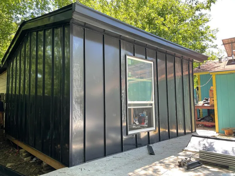 Black standing seam metal wall panels for Metal Roof Installation in South Miami